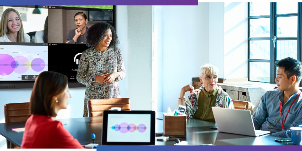 Team in conference room collaborating using OneScreen Touchscreen technology